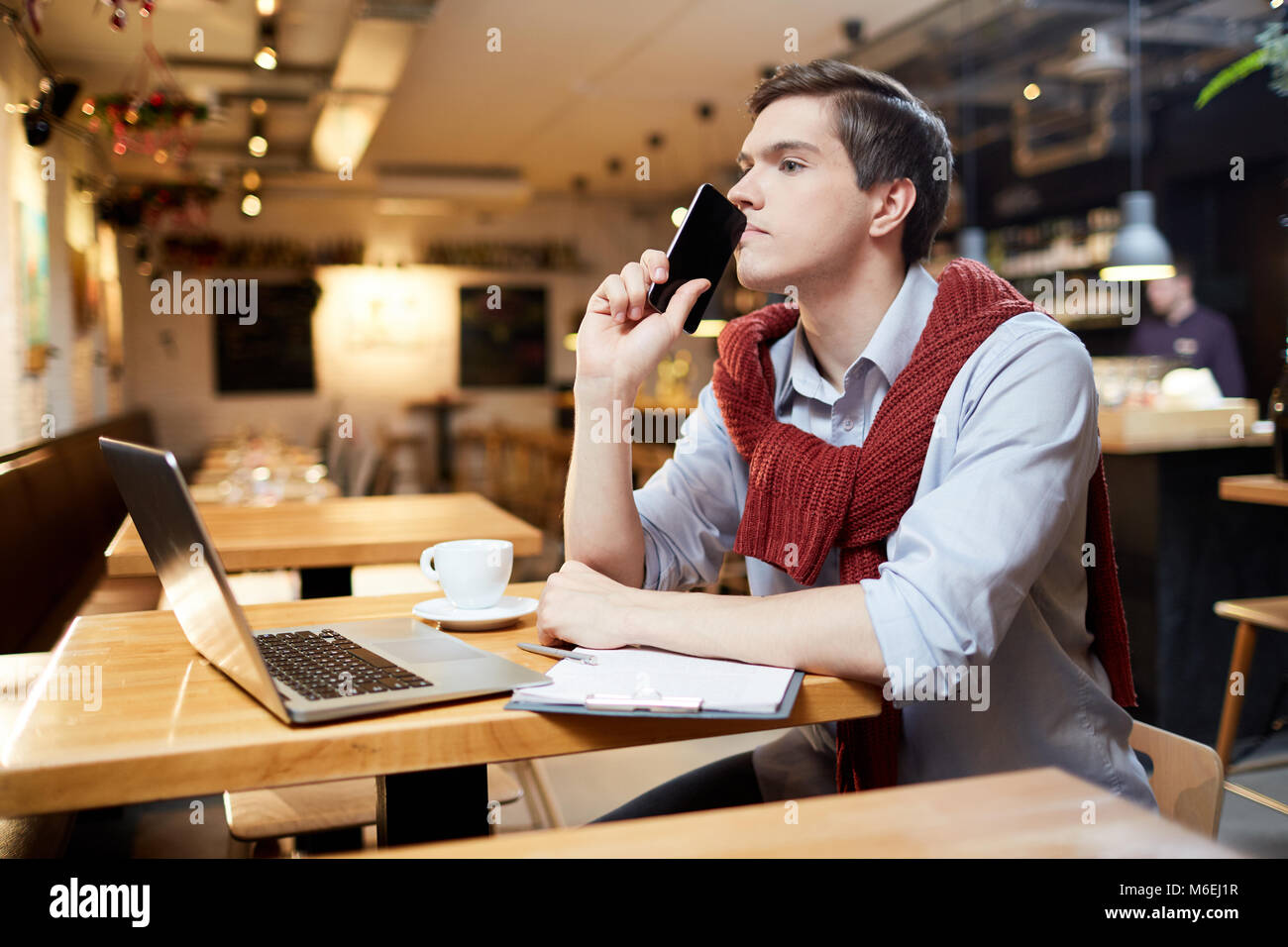 Pensive young man thinking working hi-res stock photography and images ...