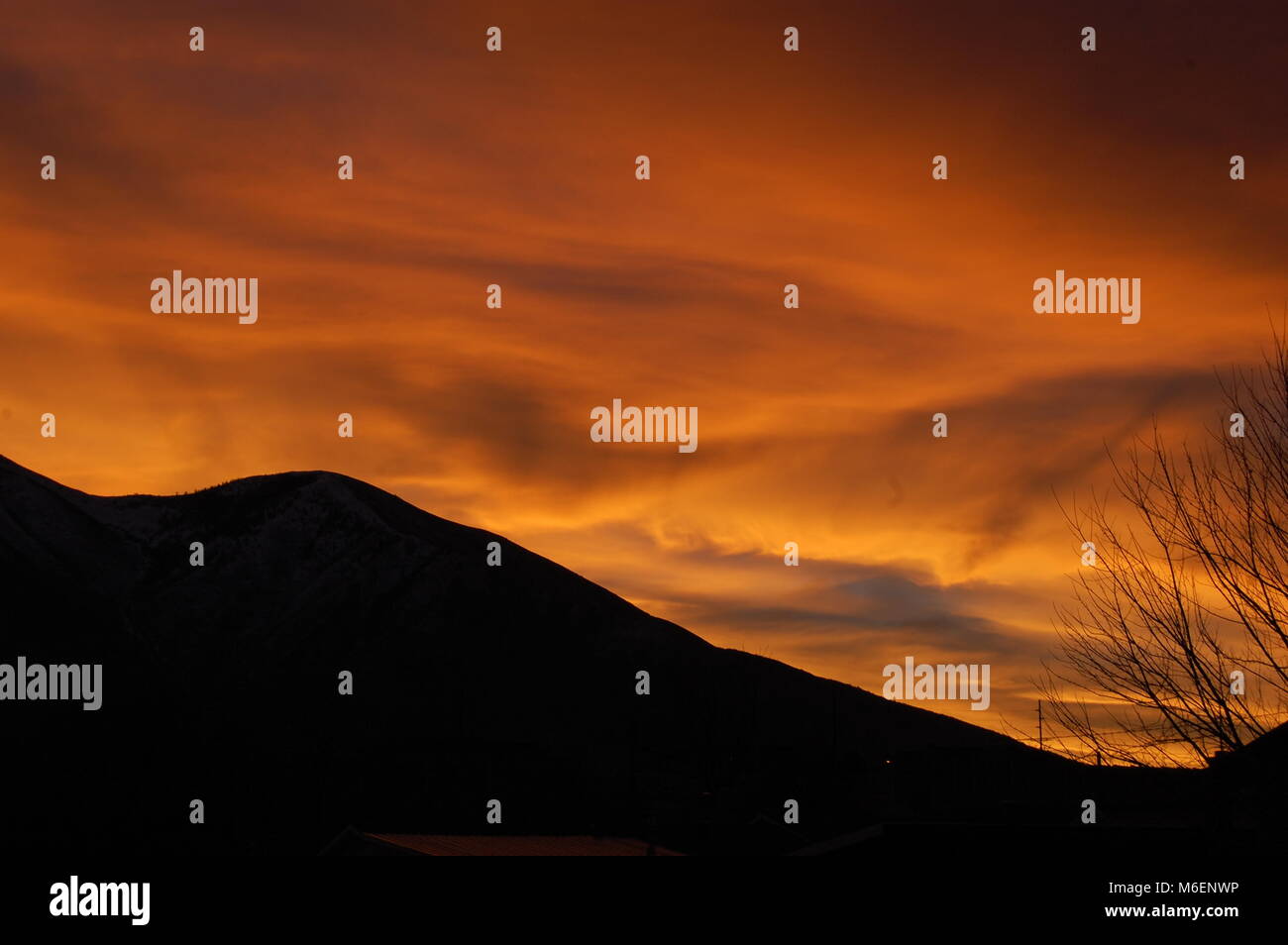 Sunset over Mountain and Tree Stock Photo - Alamy