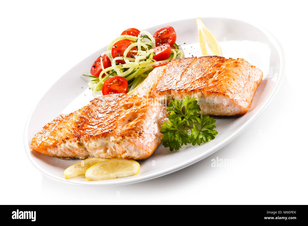 Grilled salmon and vegetables on white background Stock Photo - Alamy