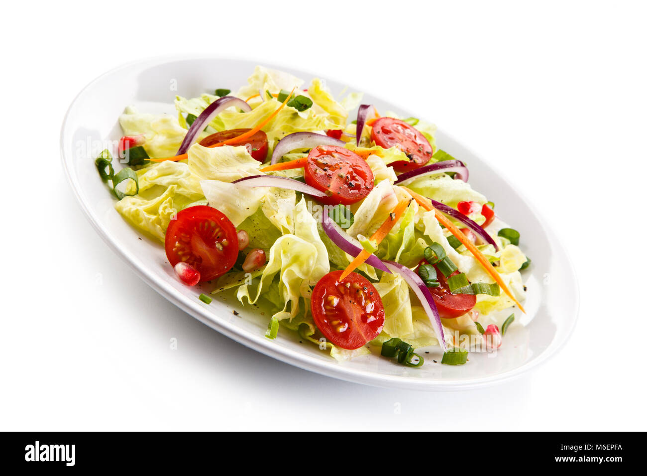 Vegetable salad on white background Stock Photo - Alamy