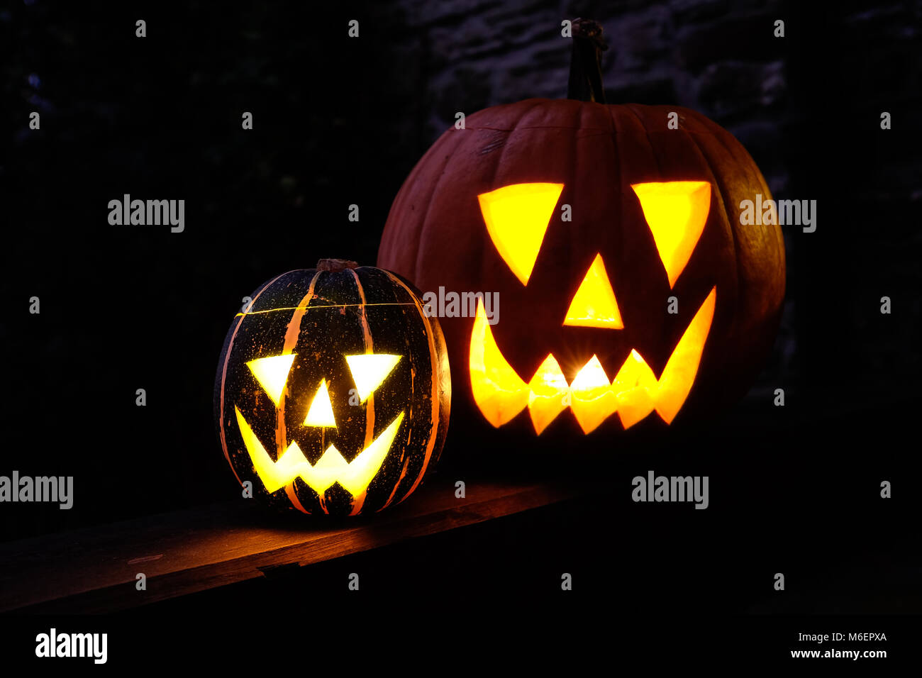 Halloween pumpkins one large and one small Stock Photo