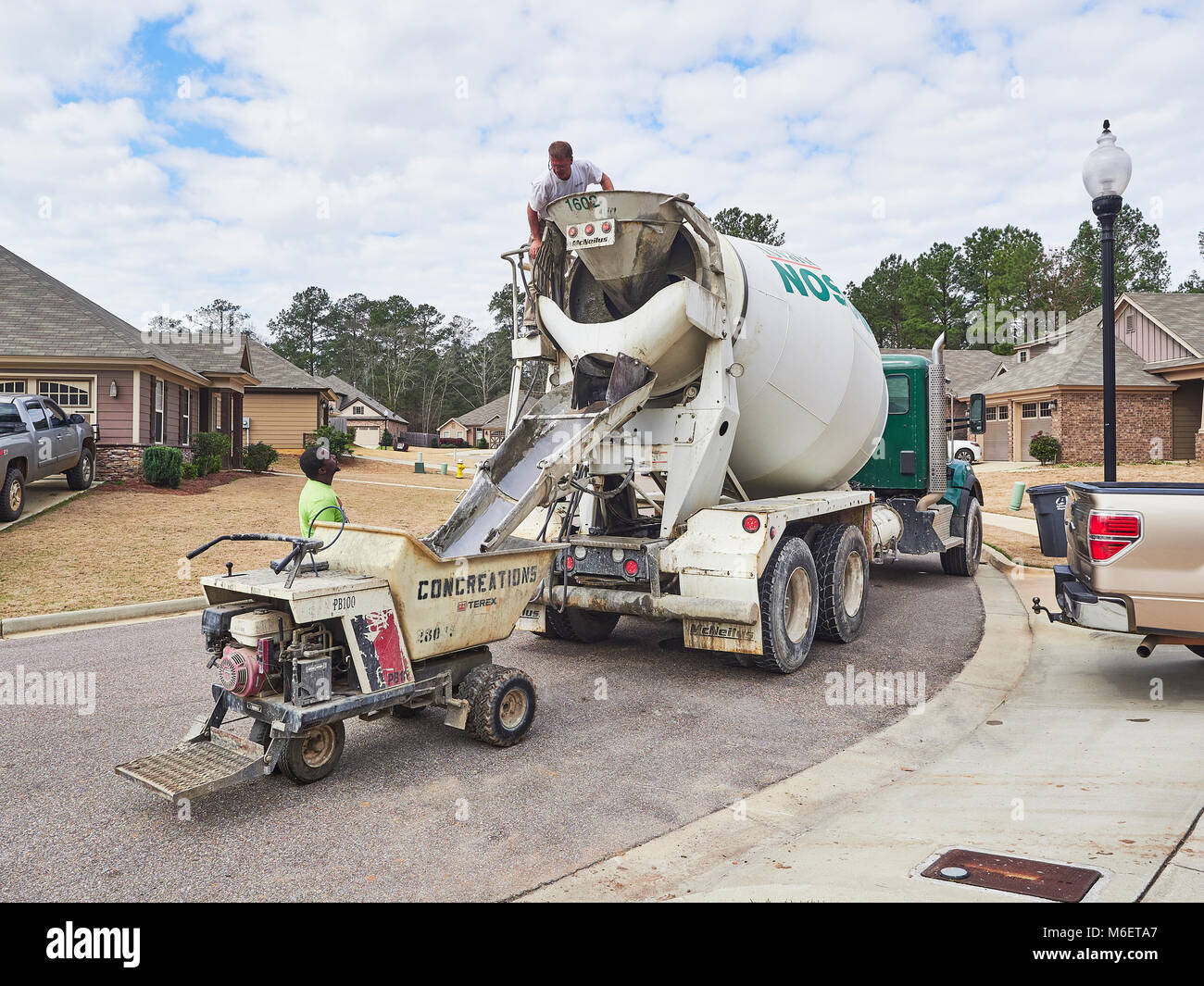 Cement truck pouring hires stock photography and images Alamy