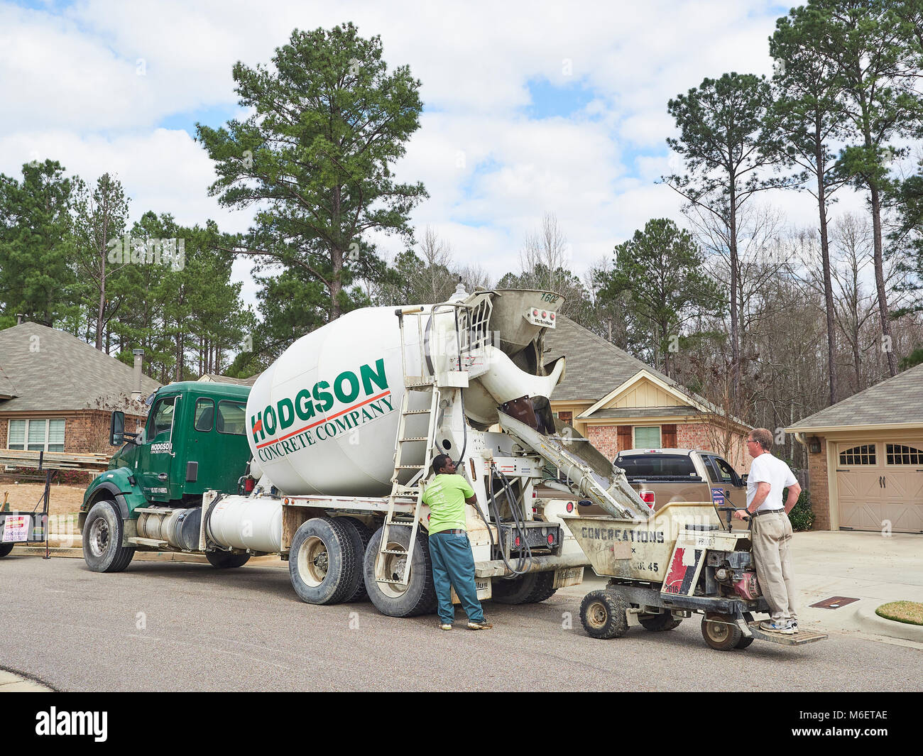 Hodgson concrete truck delivering concrete to a residential