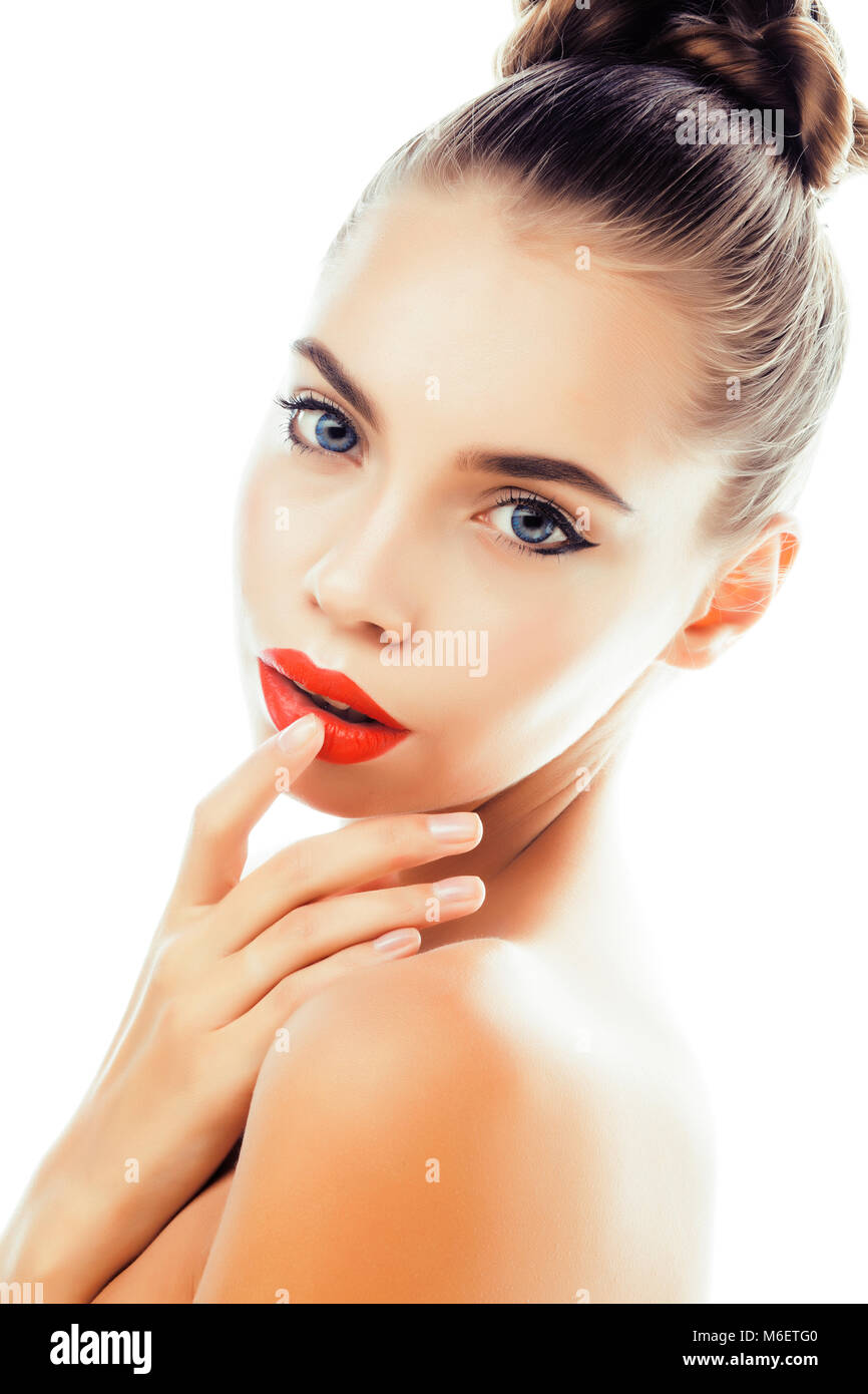 young pretty girl with clean skin posing smiling isolated on