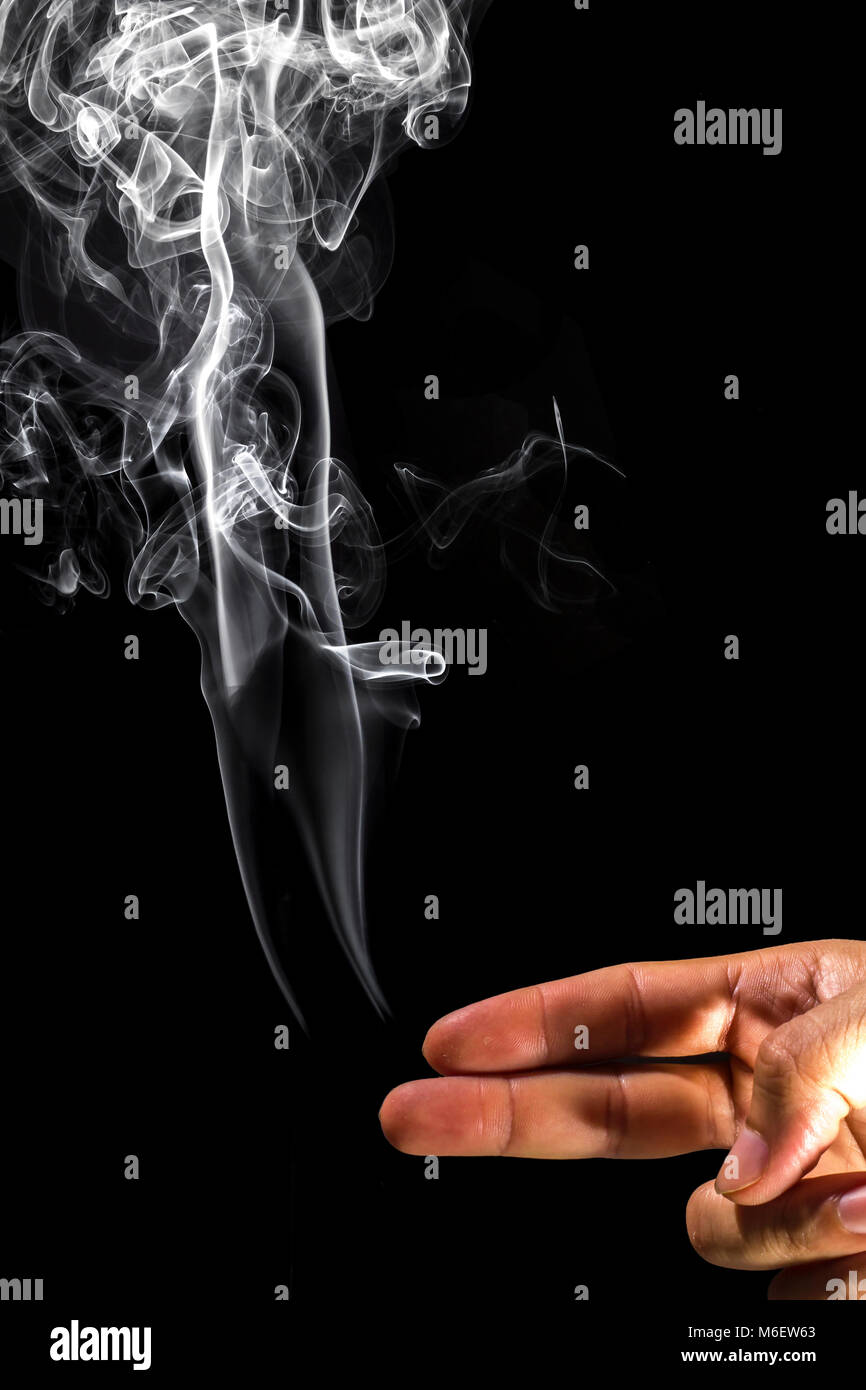 The smoke from the tip of the finger.Look like the cigarette in hand ...
