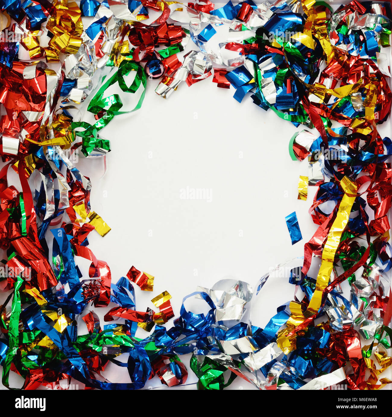Background with scattered colorful confetti on white paper Stock Photo ...