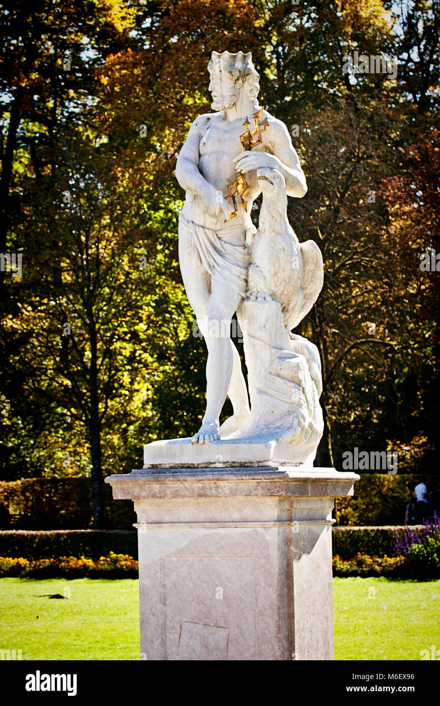 MUNICH, GERMANY - Nymphemburg palace gardens: mythological statue of Greek god Jupiter, by Dominik Auliczek, XVIII century Stock Photo