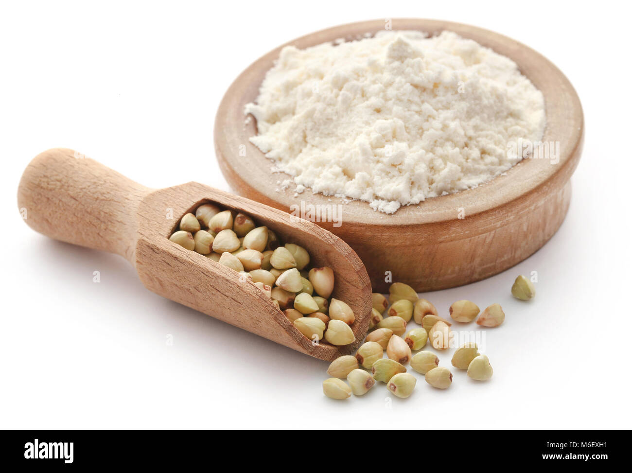 Buckwheat with flour over white background Stock Photo Alamy
