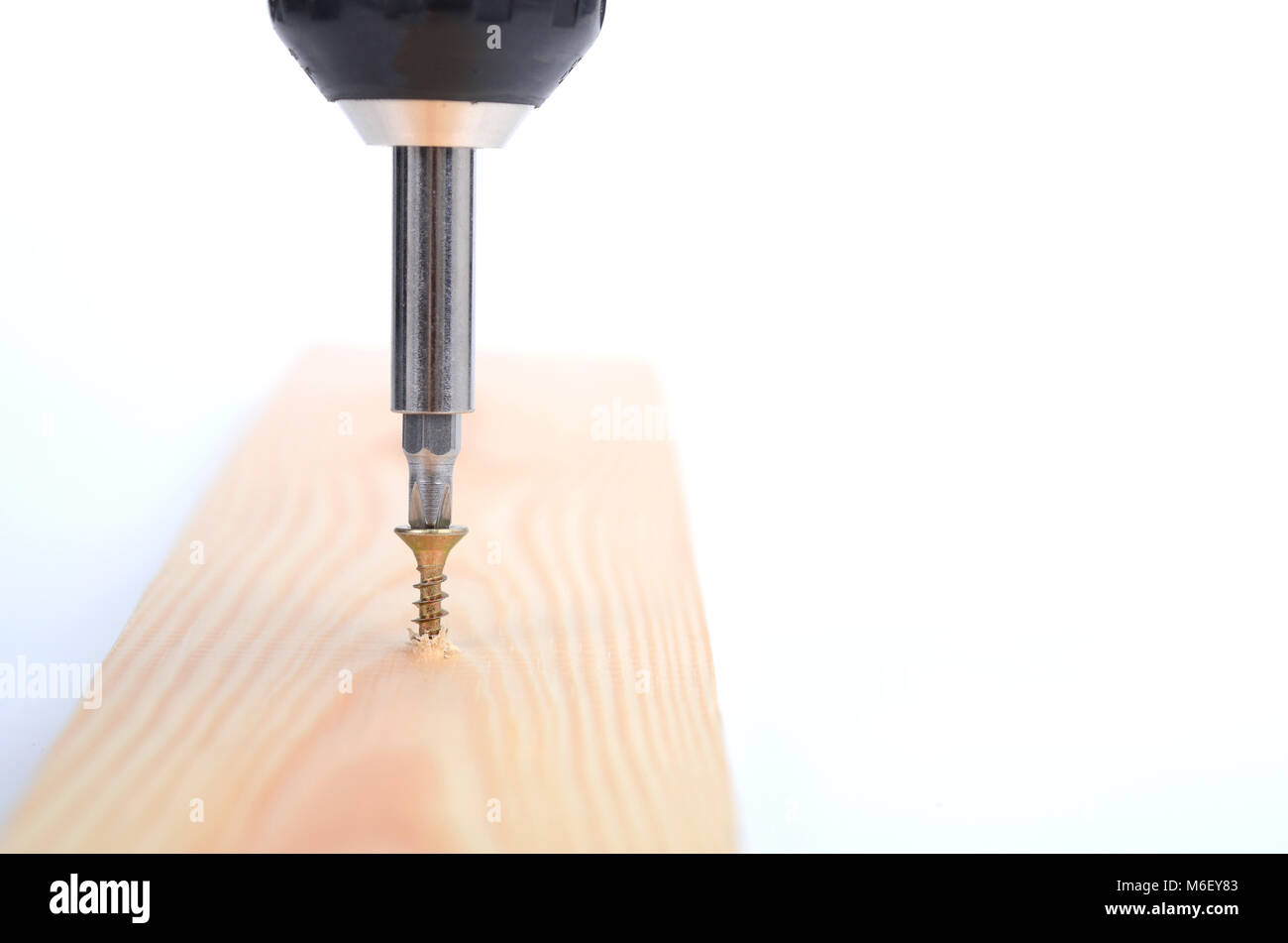 Wood Screw being screwed into a wood , Carpenter woodwork, screwing