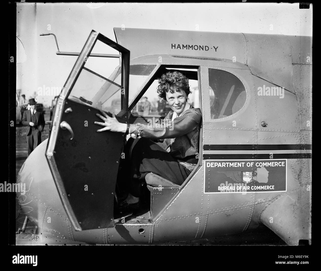 Amelia Earhart in the cockpit of a U.S. Bureau of Air Commerce airplane, Washington, DC, 1936 Stock Photo