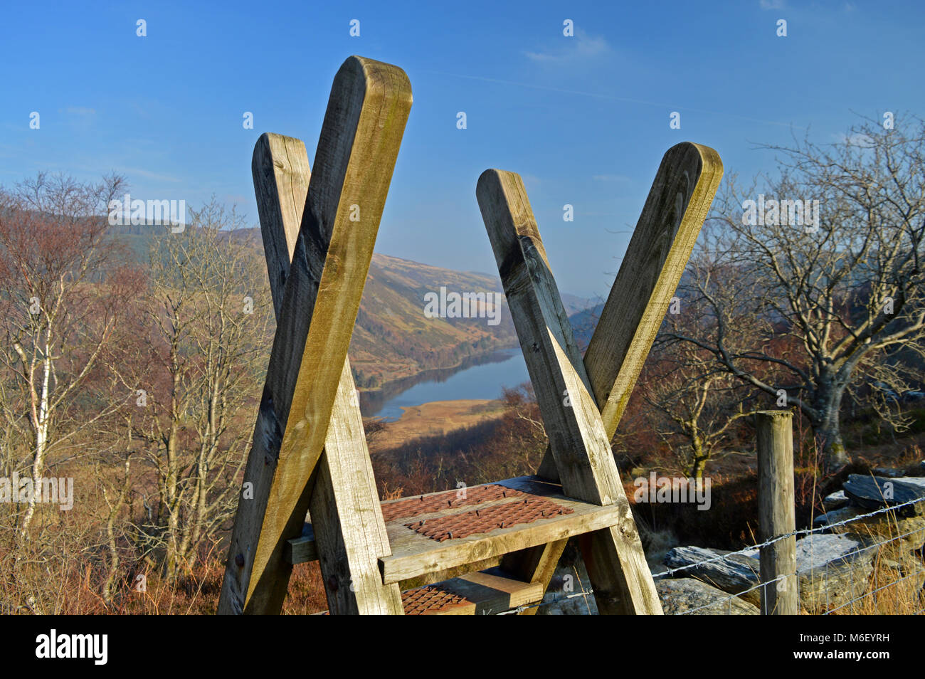 Stile overlooking Llyn Crafnant reservoir and scenery Stock Photo