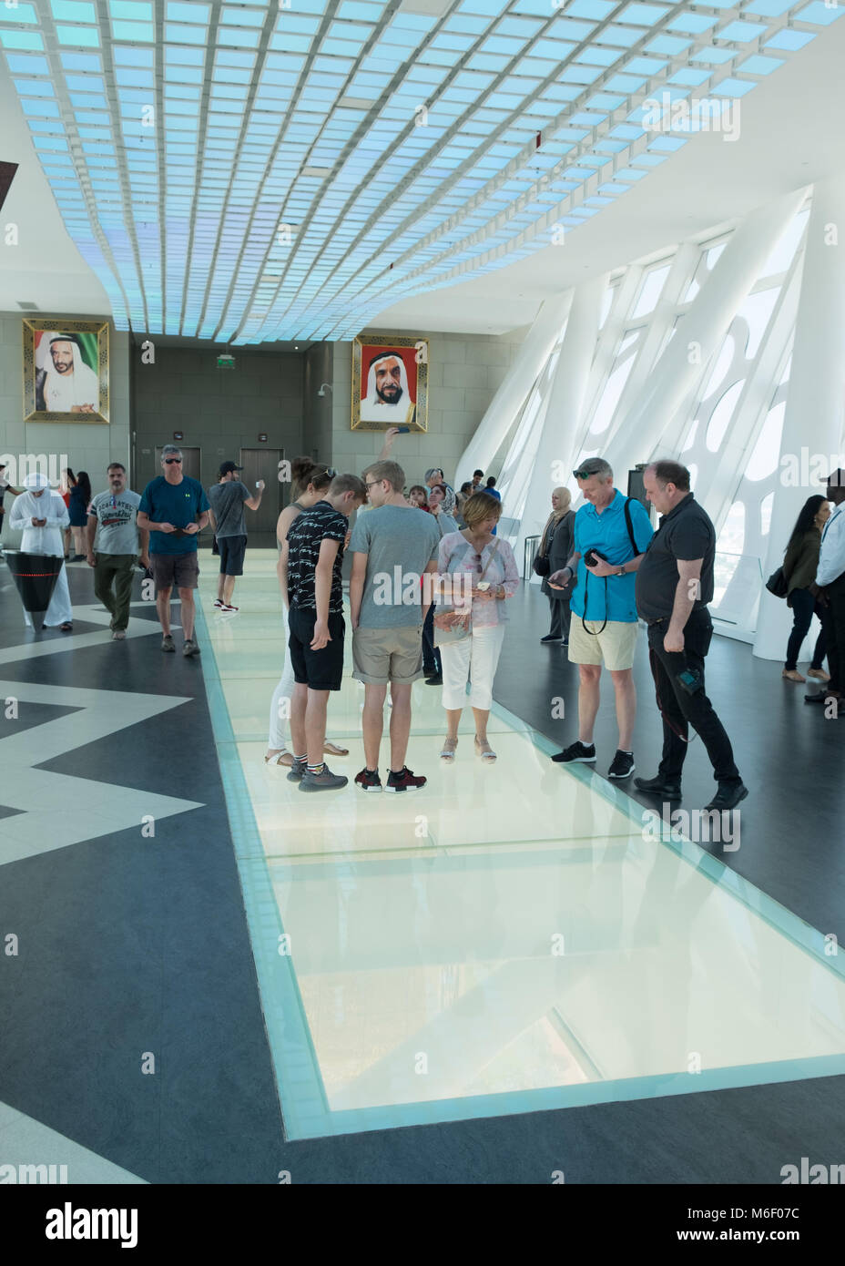 Dubai landmark The Frame, Tourists inside looking through the transparent walkway, Stock Photo