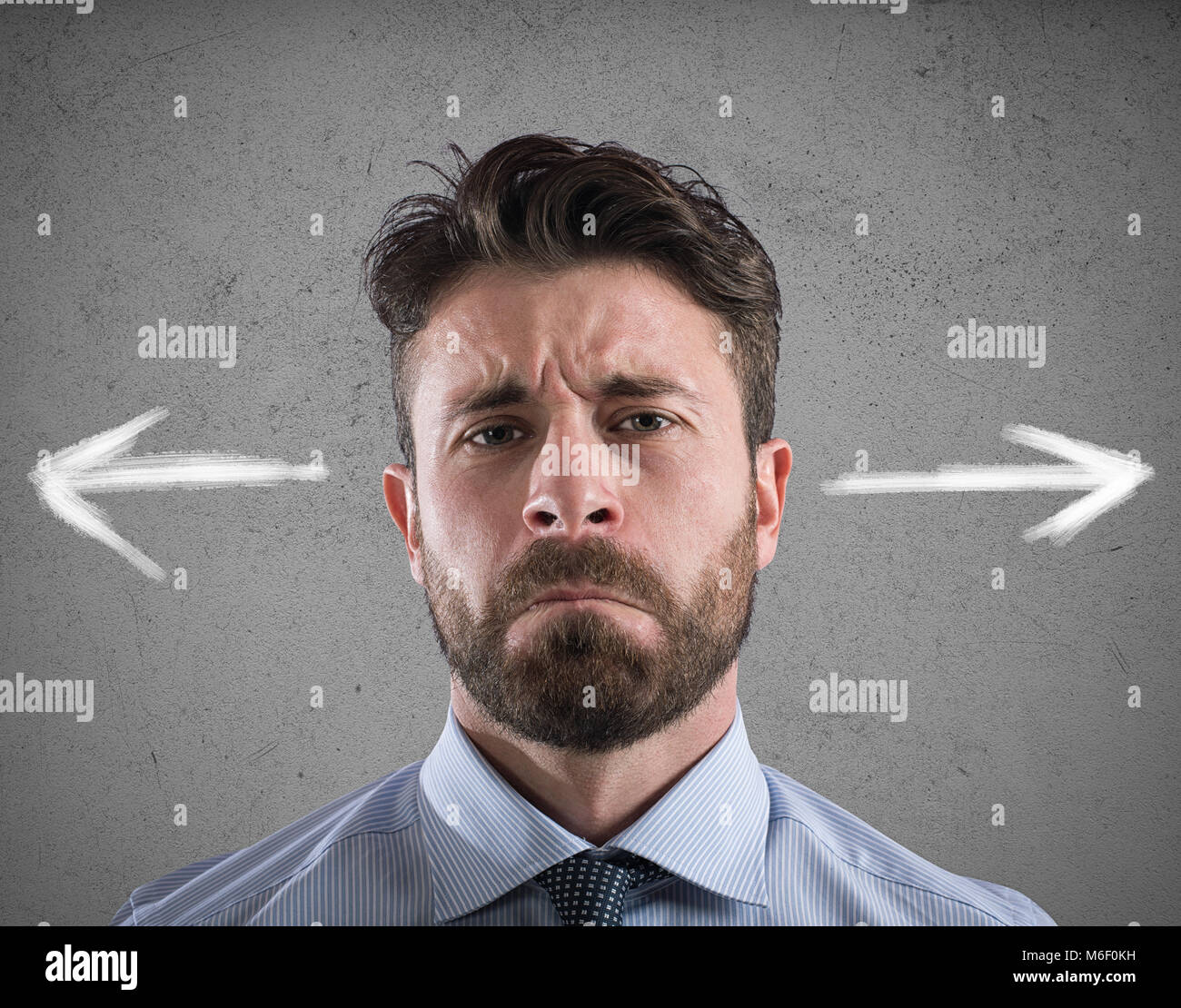 Difficult choices of a businessman. concept of confusion Stock Photo
