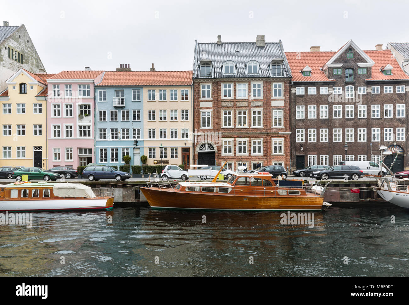 Gray clouds over the Nyhavn in Copenhagen, Denmark. Stock Photo