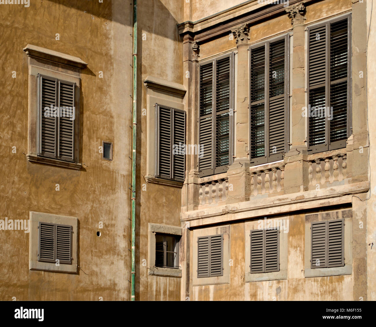 Walls and shuttetred windows in the Pitti Palace, Florence, Italy Stock Photo