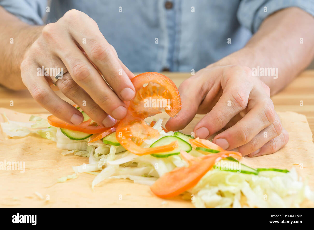 Making vegetarian flat bread sandwich Stock Photo Alamy