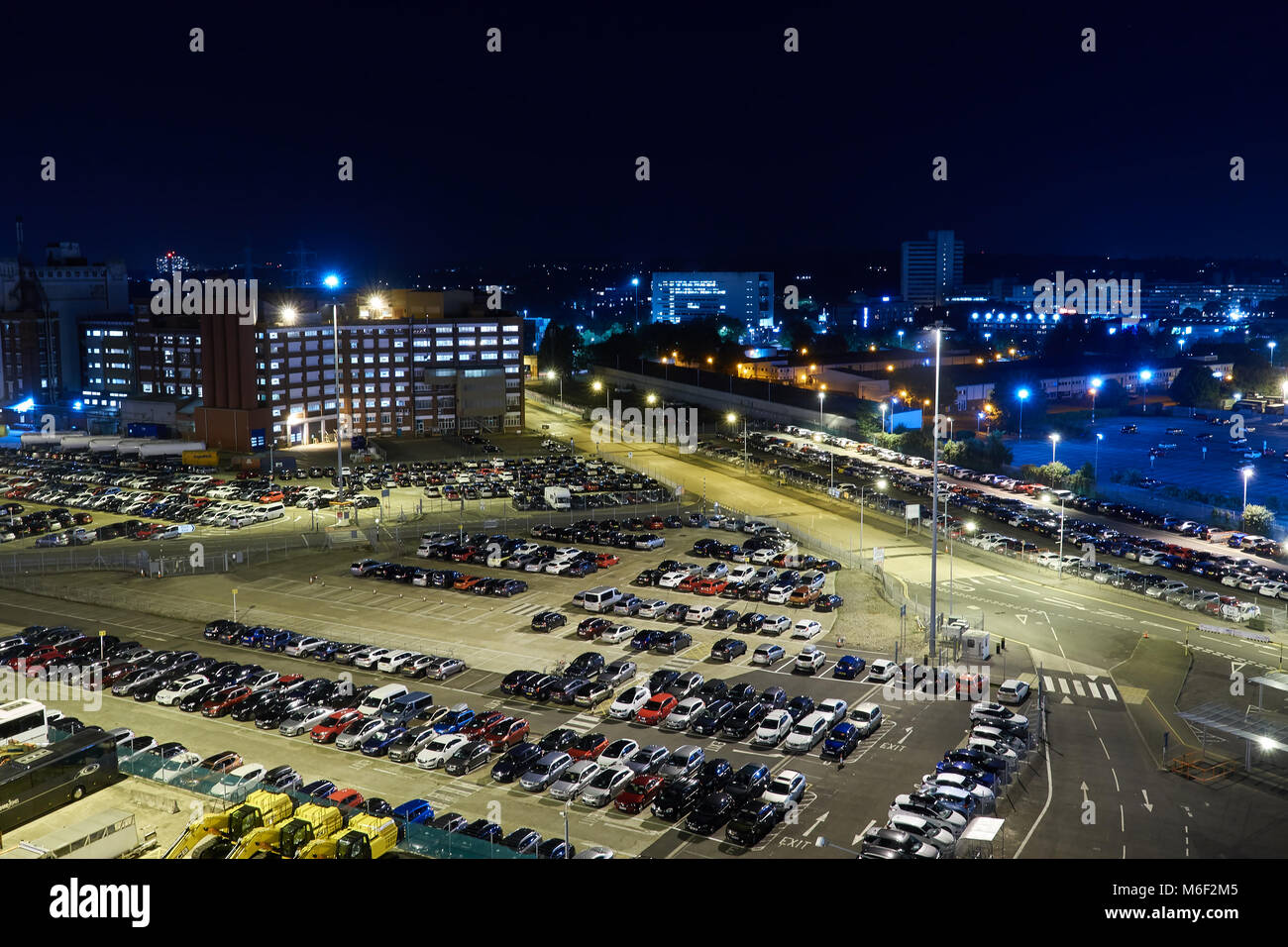 Parking in the night city. View from above. Stock Photo