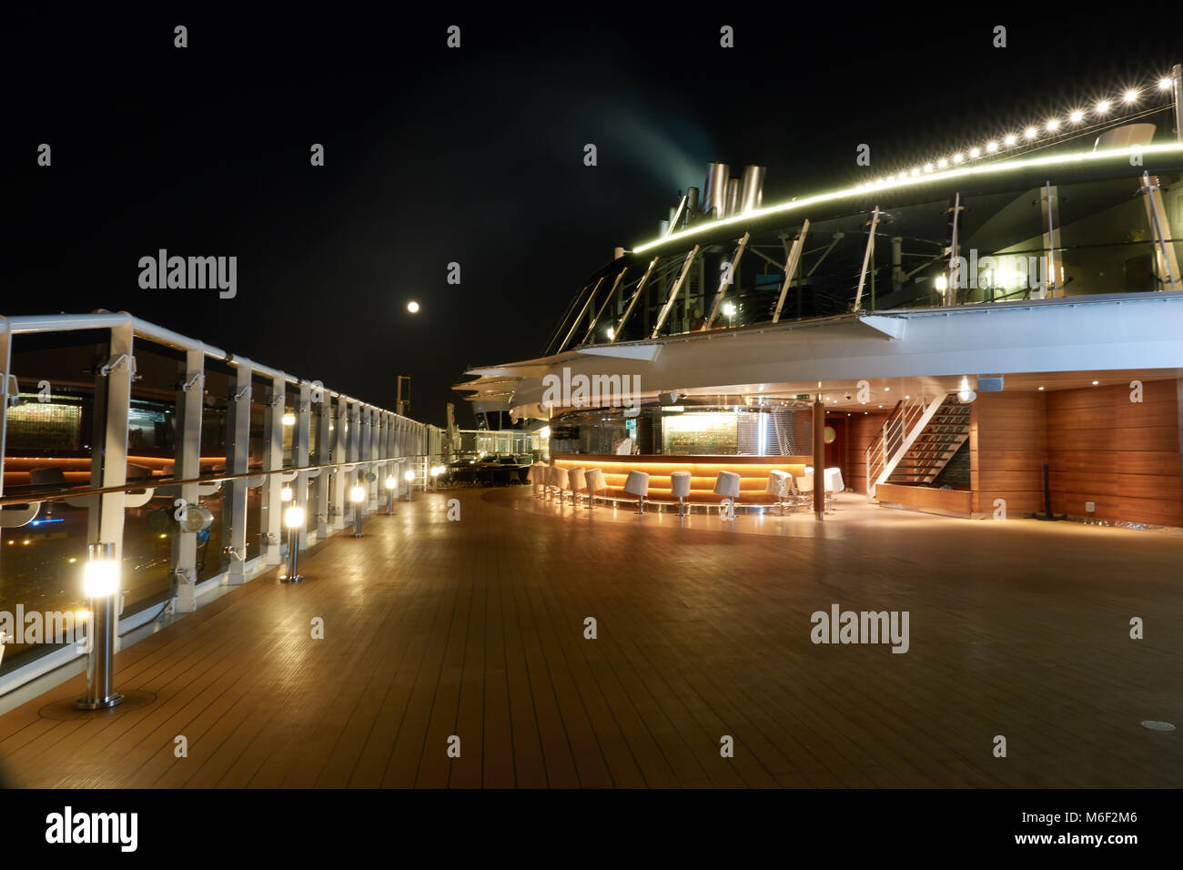 Beautiful deck of a cruise ship at night without people. Stock Photo