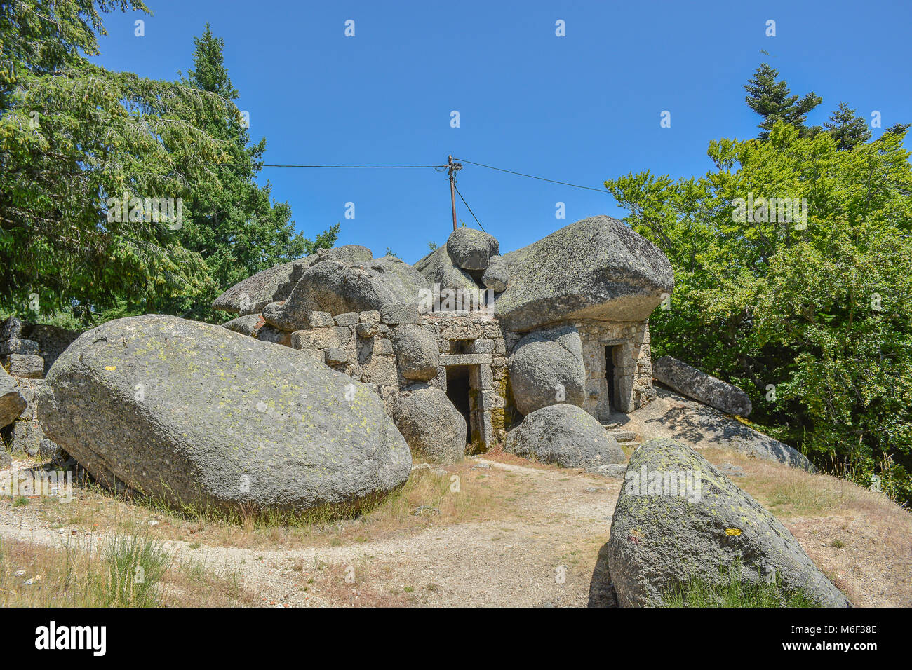 House inside the rock hi-res stock photography and images - Alamy