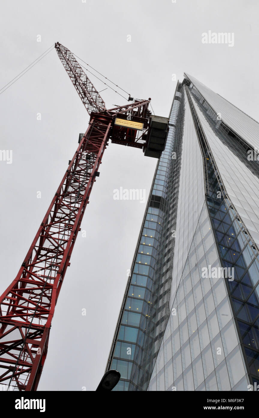 Arcane on a building or construction site next to the shard office  buildings in central london. Constructing new offices and apartments or  flats city Stock Photo - Alamy