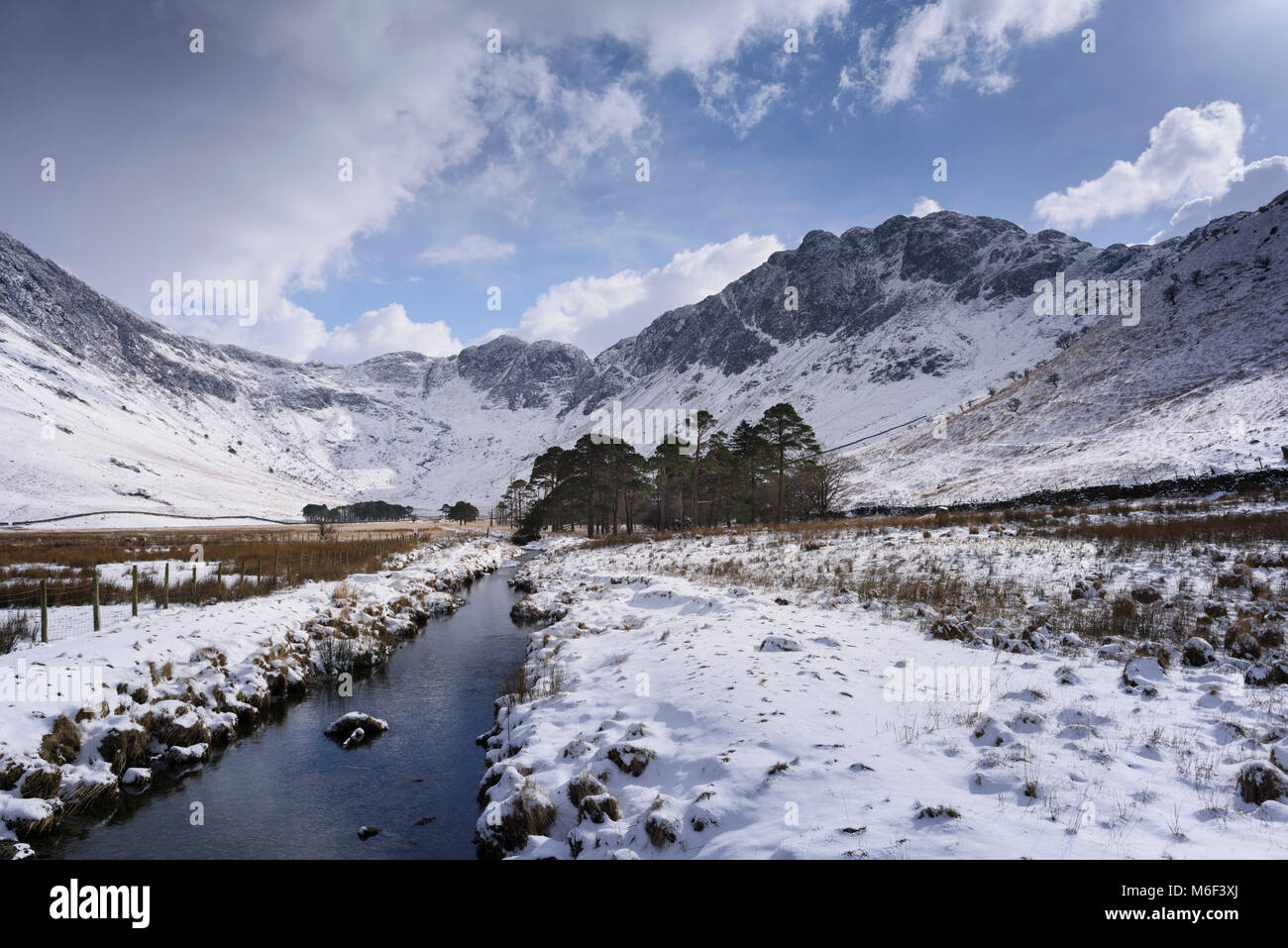Winter snow clad fell Haystacks a mountain in the Buttermere region of the English Lake District. The landscape is viewed here from Warnscale Bottom Stock Photo