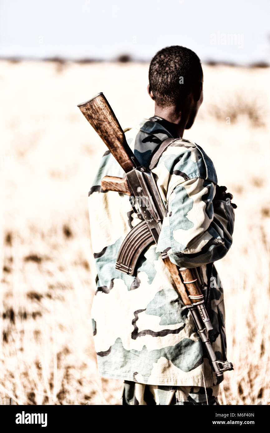 africa in the land of ethiopia a black soldier and his gun looking the ...