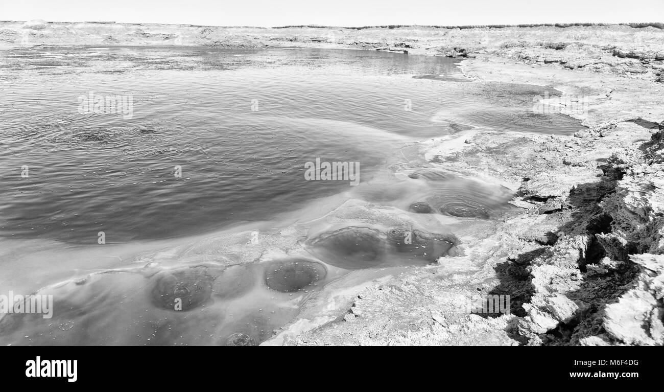 in  danakil ethiopia africa    the black lake with boiling oil and hot Stock Photo