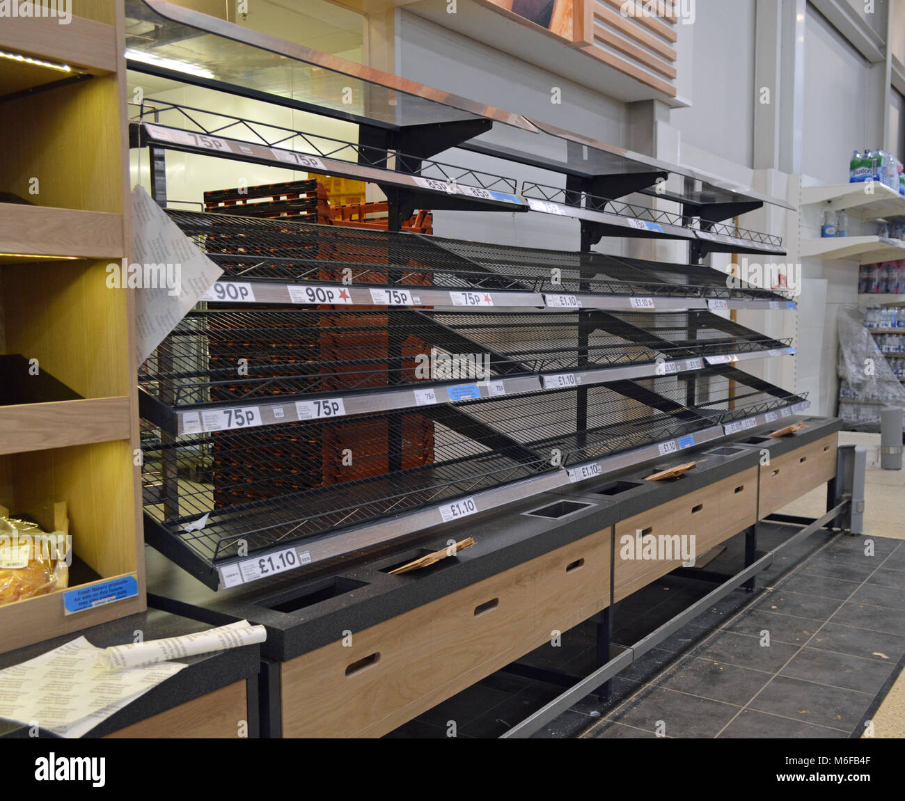 Post snow, low stocks on supermarket shelves in Tesco Fforestfach Stock Photo Alamy