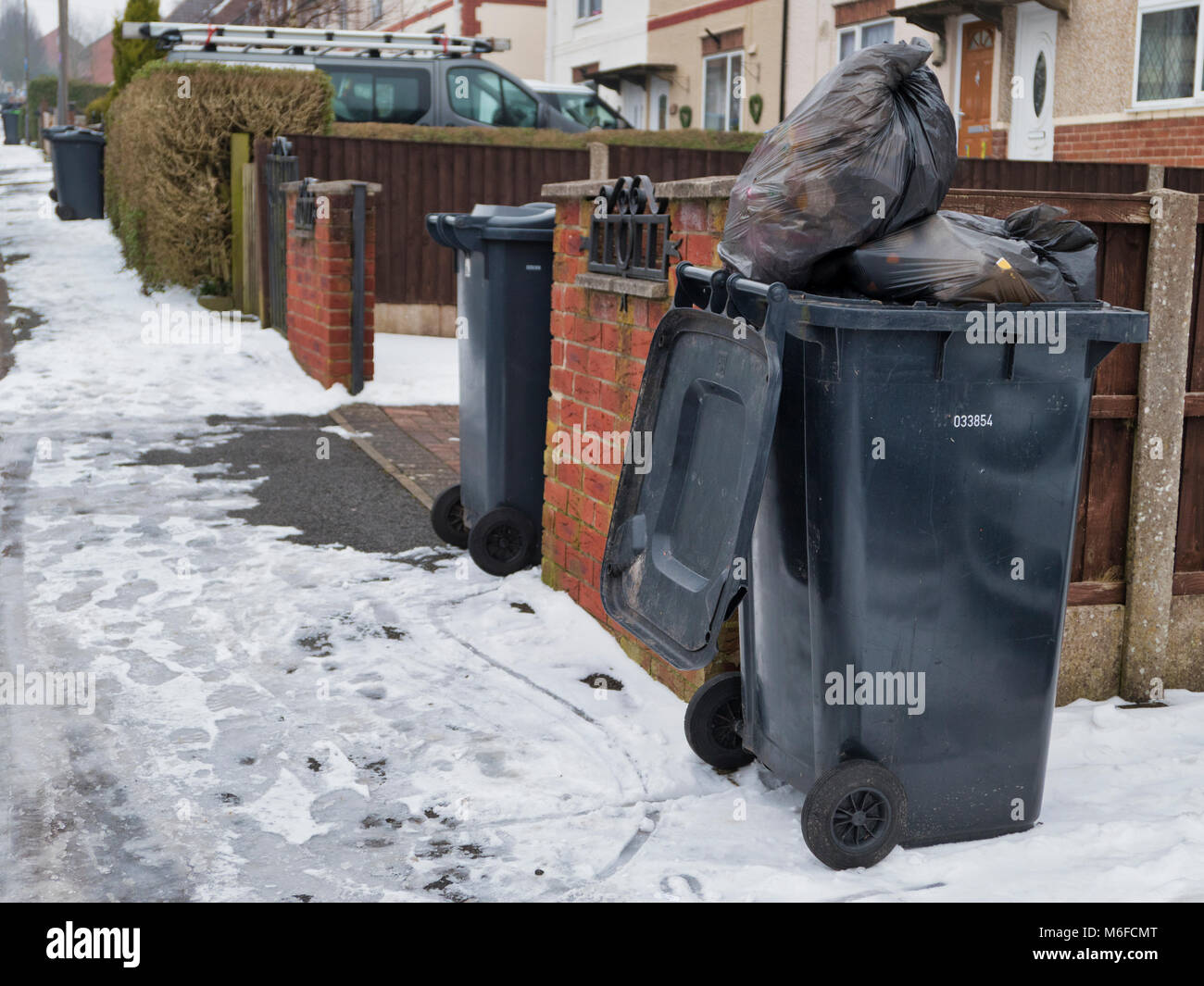 Ashourne, Derbyshire. 3rd March 2018. UK Weather: overflowing bins from Thursday awaiting collection by Derbyshire Dales District Council as they catch up on bin collections after the cold snowy weather in Ashbourne, Derbyshire, England, UK Credit: Doug Blane/Alamy Live News Stock Photo
