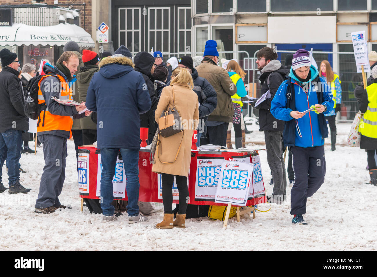 Coventry, UK. 3rd March 2018. Demonstrations and protests against privatization and reduced funding on National Health Service (NHS), in feezing winter conditions, organized by the socialist party in Coventry city centre, Godiva square, Coventry, United Kingdom 3rd March 2018. Credit: Wael Alreweie/Alamy Live News. Stock Photo