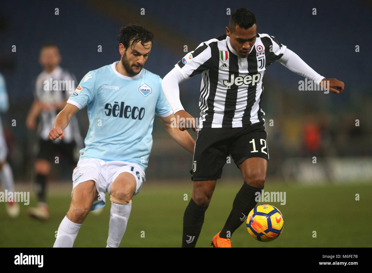 3.03.2018. Stadio Olimpico, Rome, Italy. Serie A. SS Lazio vs Fc Juventus.MARCO PAROLO (LAZ) AND ALEX SANDRO (JUV)  in action during the match S.S. Lazio vs F.C. Juventus at Stadio Olimpico in Rome. Credit: marco iacobucci/Alamy Live News Stock Photo