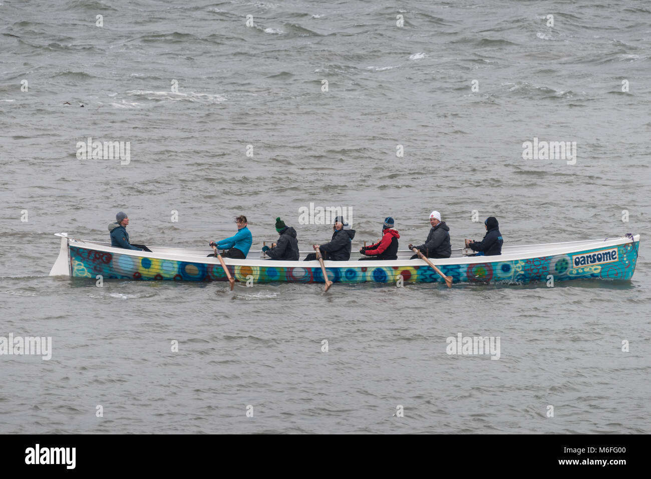 UK Weather - The Appledore Ladies Gig Crew brave the choppy conditions on the River Torridge in the aftermath of storm Emma in North Devon. Stock Photo