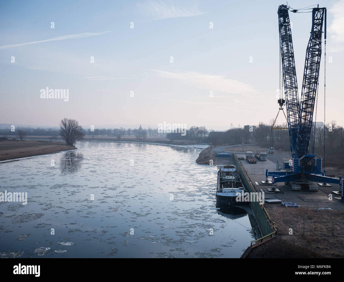 Dresden, Germany. 3rd March, 2018. View over the werft and Elbe River with sheets of ice floating in it. As seen from the Elbebrücke, Winter in Dresden, Saxony, Germany Credit: Krino/Alamy Live News Stock Photo