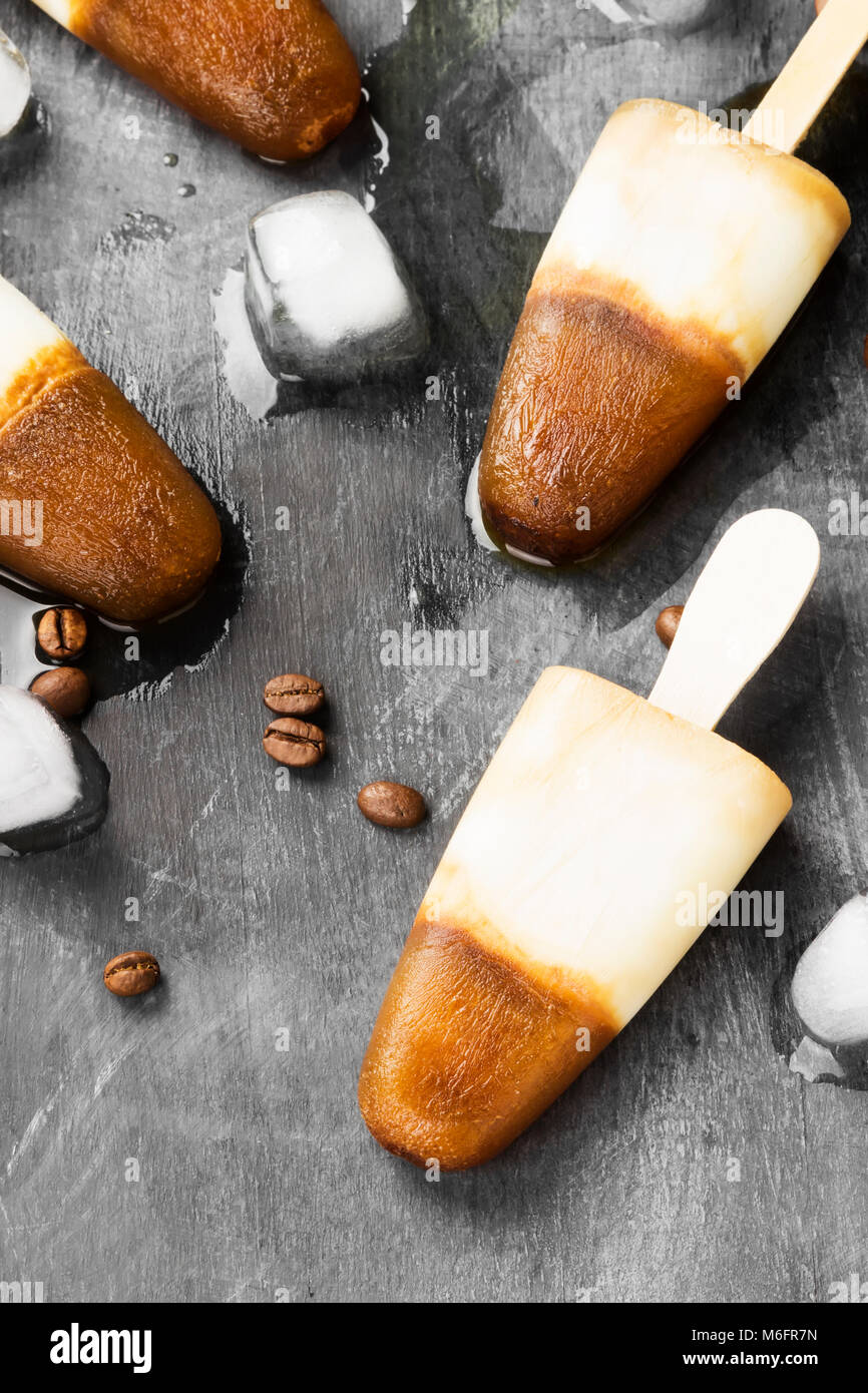 Coffee ice cream popsicles on a dark background Stock Photo Alamy
