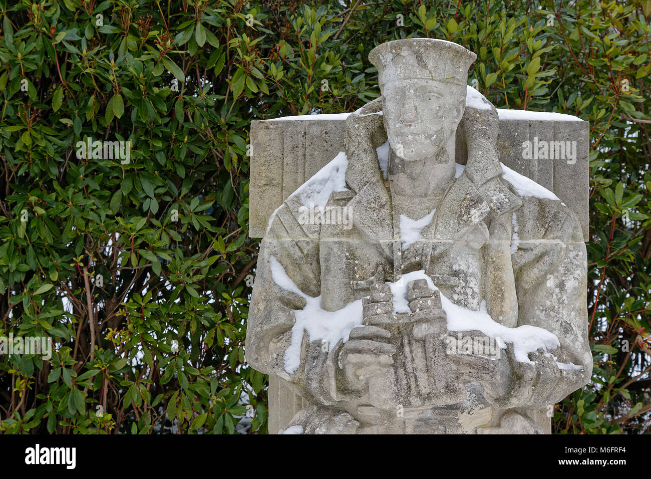 WW2 naval sculpture of a Royal Marine and Royal Artillery sailor by Charles Wheeler now at Brookwood Cemetery. Stock Photo