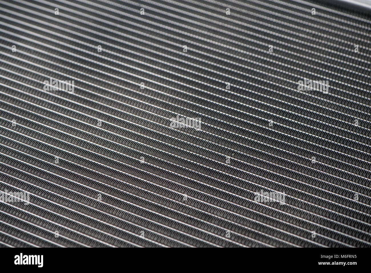 Close up of high performance automobile radiator cooler fins. Stock Photo