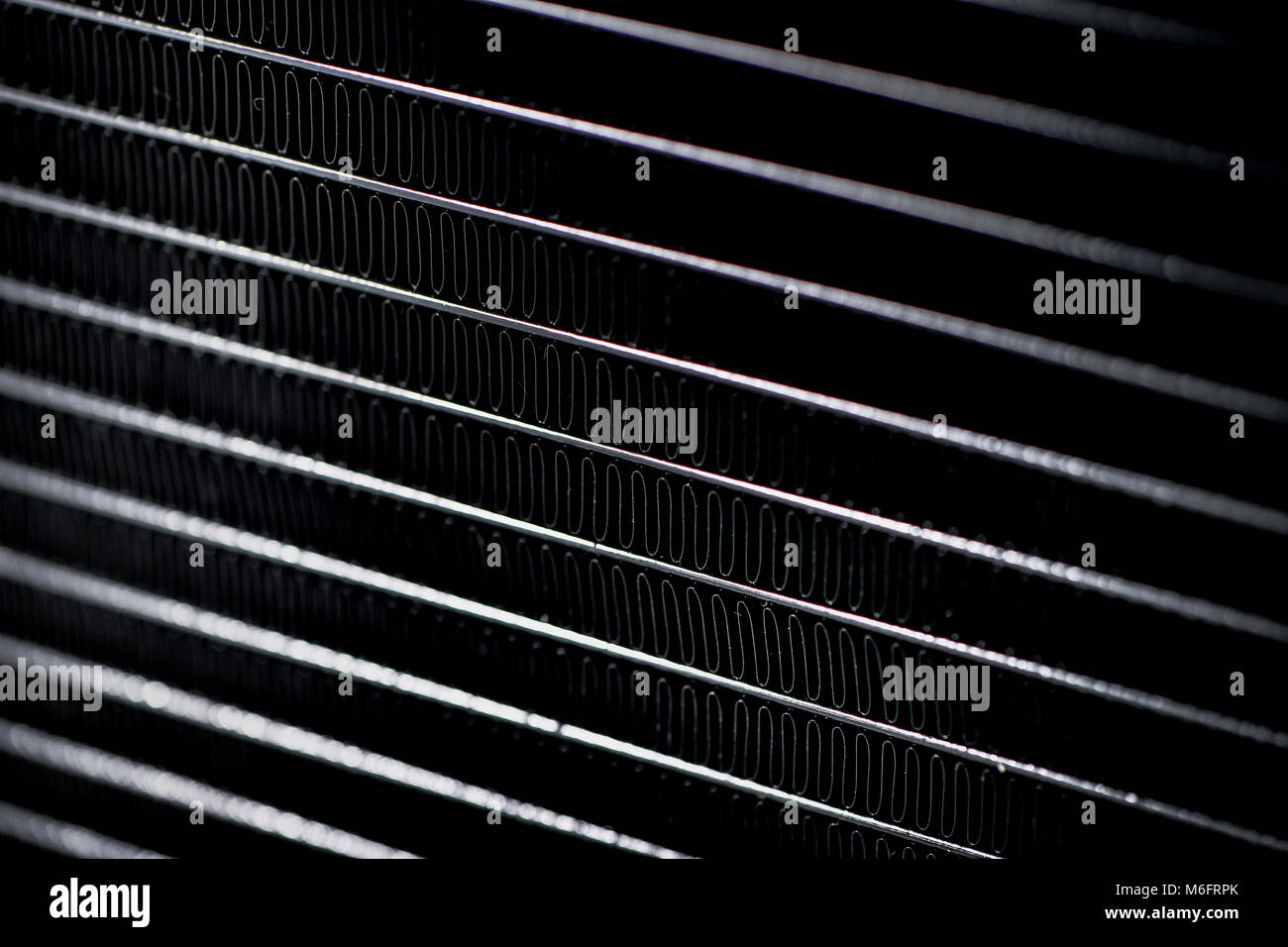Close up of high performance automobile radiator cooler fins. Stock Photo