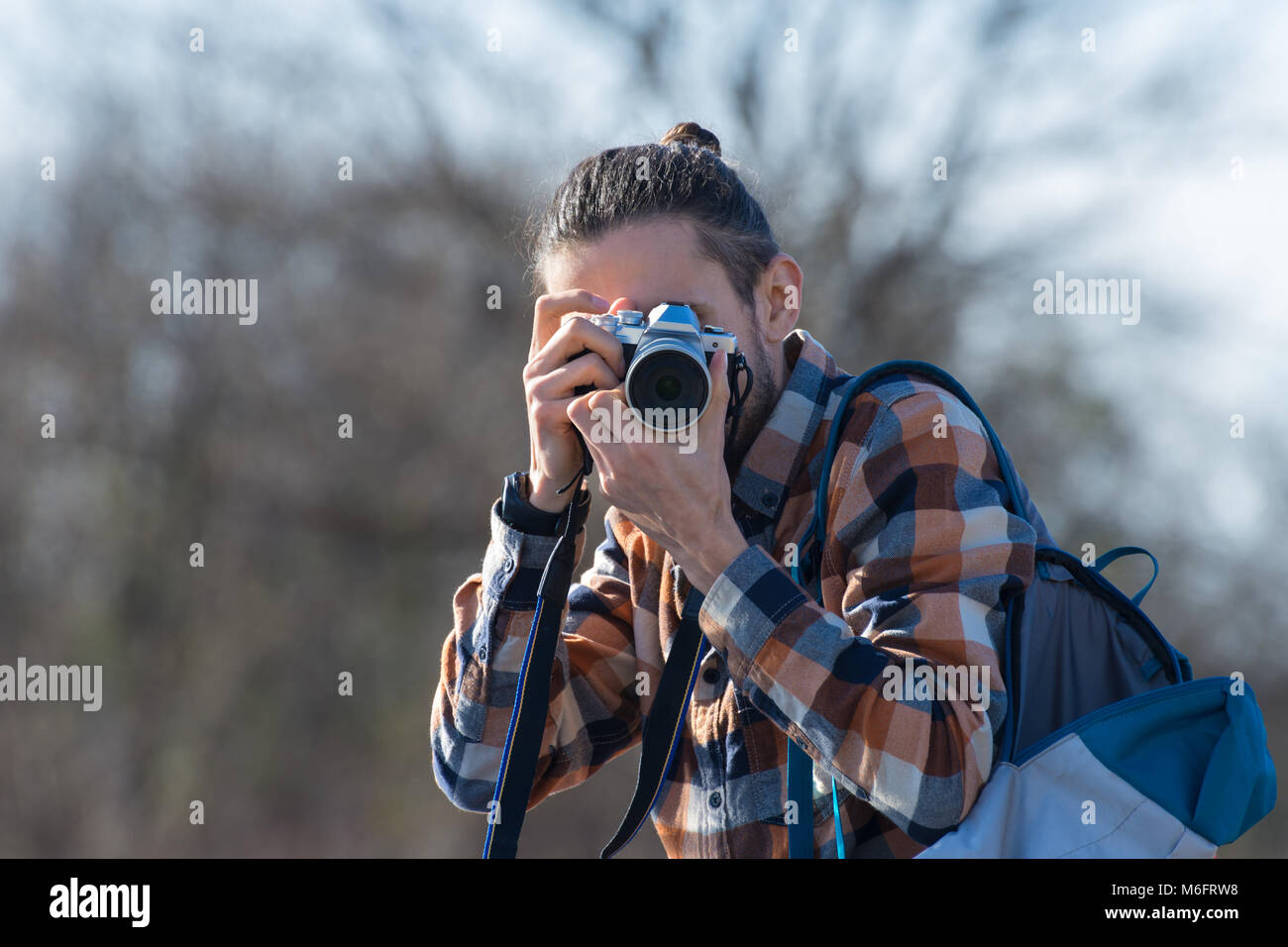 Photographer with a camera shot closeup Stock Photo
