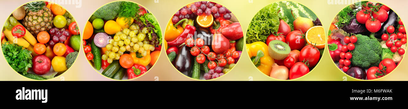 Panoramic photo fresh fruits and vegetables in round frame on light blurred background. Stock Photo