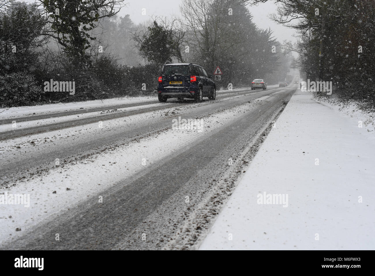 A Skoda Yeti 4x4 car makes its way along the A36 towards Salisbury in treacherous snow covered conditions . Stock Photo