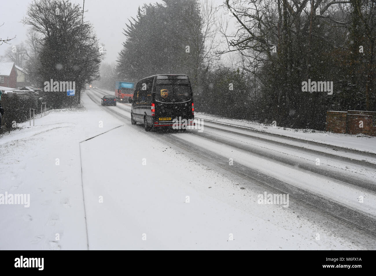 A UPS van makes its way along the A36 in treacherous snowy conditions during the March 2018  snow storm. Stock Photo