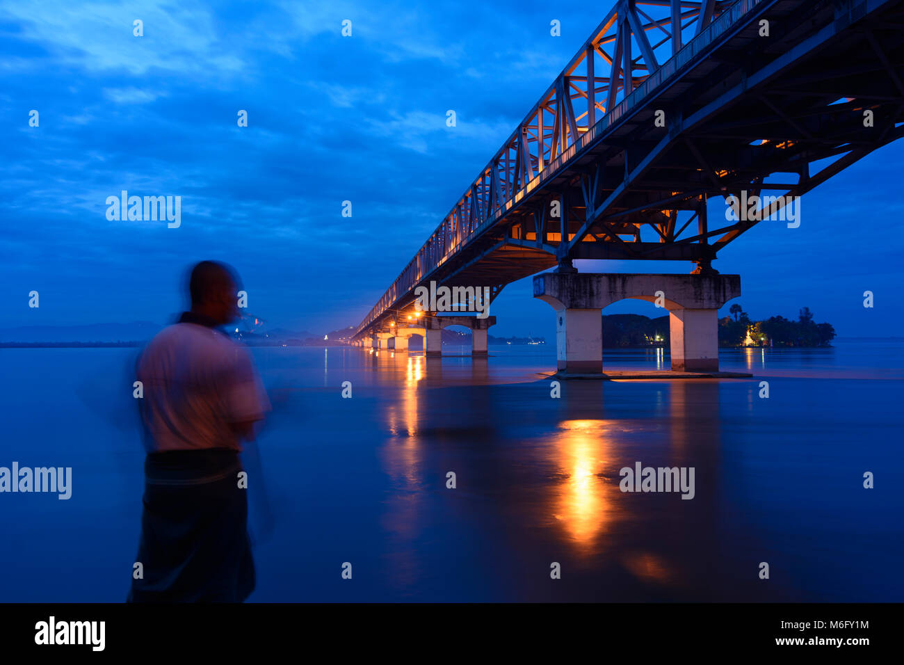 Mawlamyine (Mawlamyaing, Moulmein): Thanlwin Bridge, Thanlwin (Salween) River, road and railway bridge, man fishing, , Mon State, Myanmar (Burma) Stock Photo