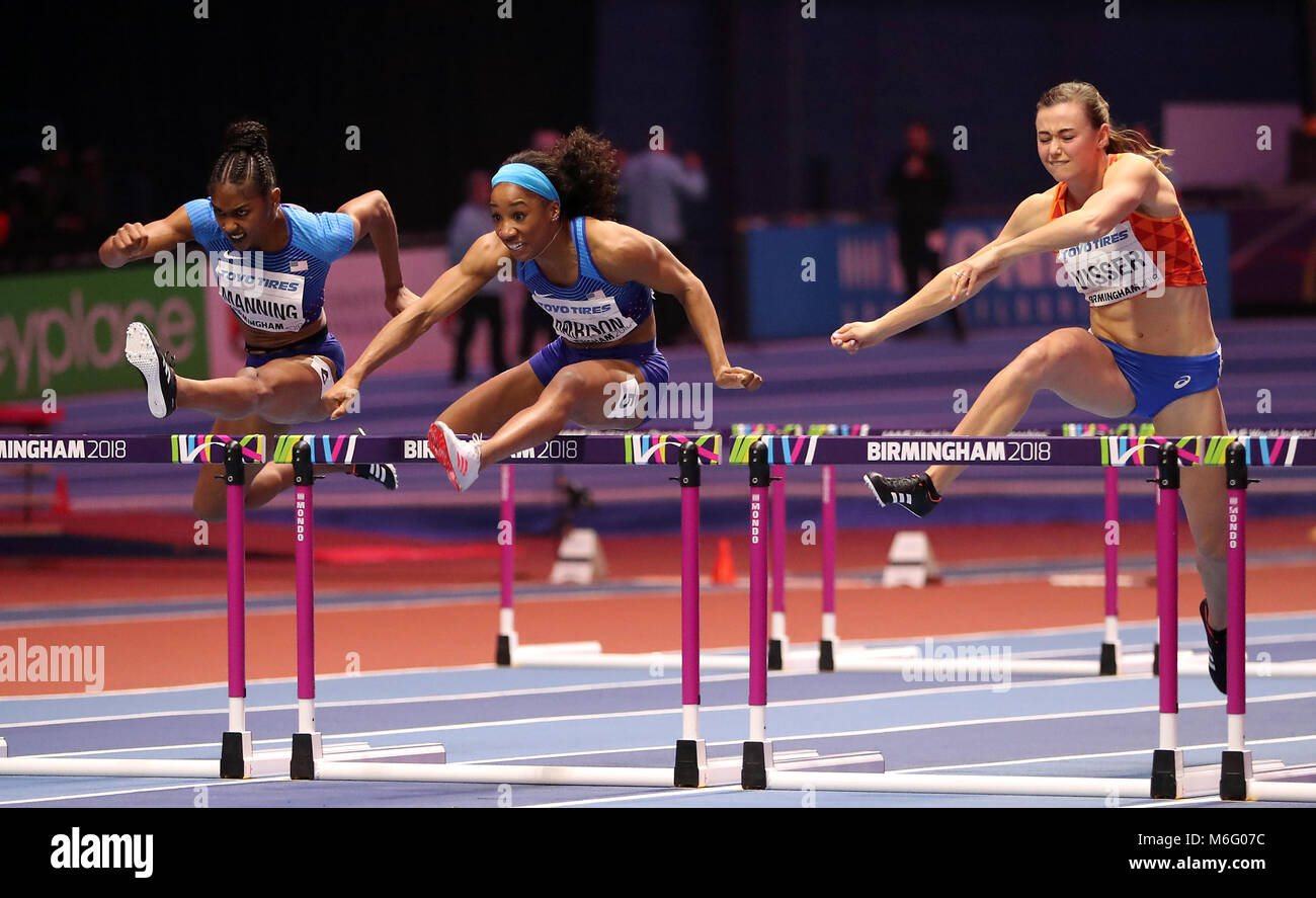 USA's Kendra Harrison (centre), Netherland's Nadine Visser (left) and USA's Christina Manning during the Woman's60 Metres Hurdles Final during day three of the 2018 IAAF Indoor World Championships at The Arena Birmingham. Stock Photo