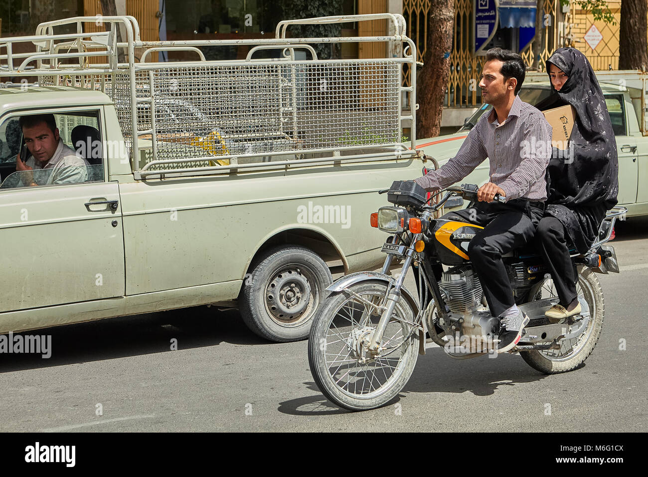 Muslim couple on motorcycle hi-res stock photography and images - Alamy