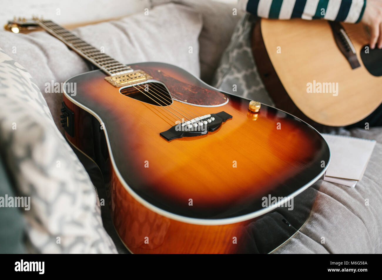 Learning to play the guitar. Music education. Stock Photo