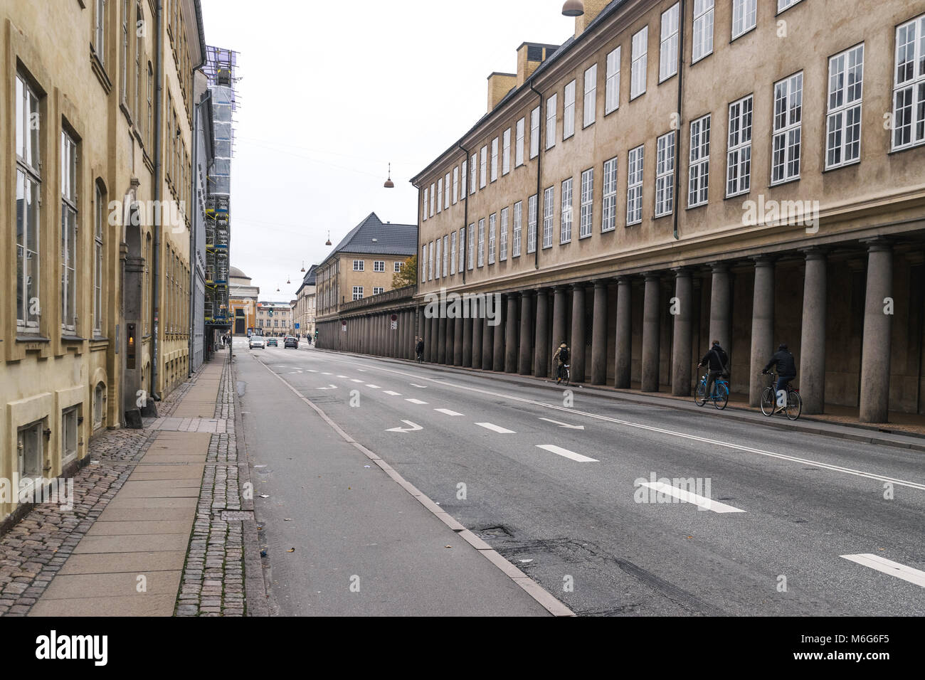 Copenhagen - October 23, 2016: A view to a gallery passing and some cyclers Stock Photo