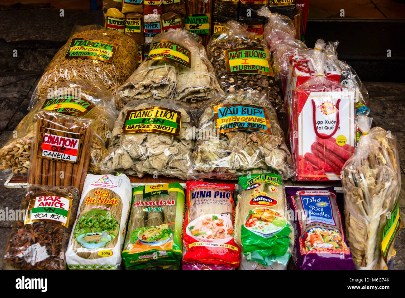 Spices, dried bamboot shoots and rice noodles for sale in Hanoi, Vietnam Stock Photo