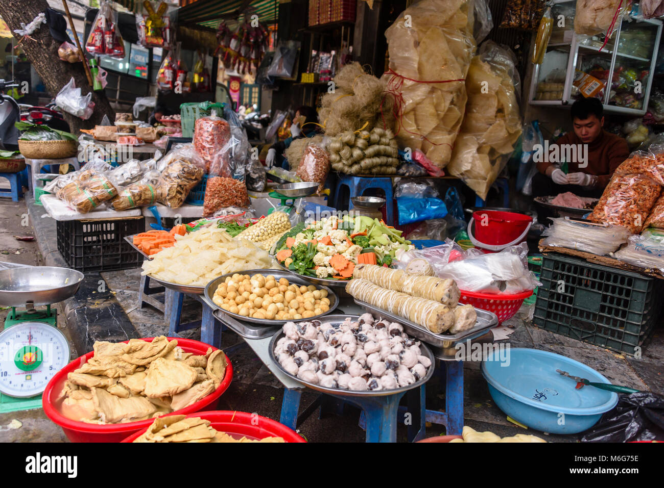 Ingredients for street food at a pop-up restaurant on a footpath in Hanoi, Vietnam Stock Photo