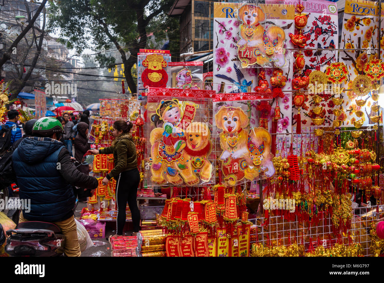 Goods to celebrate the Chinese new year on sale in 'Paper Street' in Hanoi, Vietnam Stock Photo