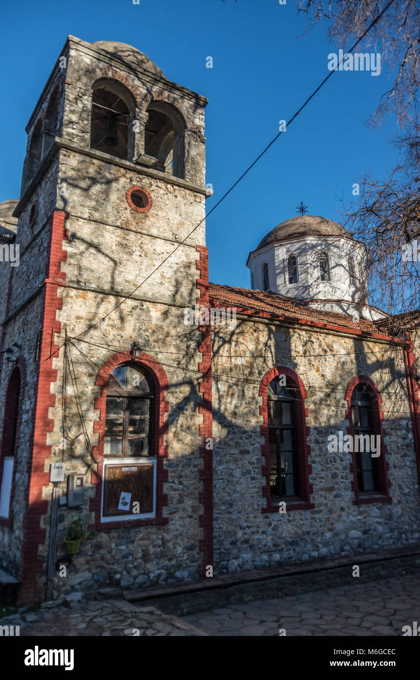 Old stonemason St. Panteleimon church with belfry. Palaios Panteleimonas, Pieria, Greece. Stock Photo